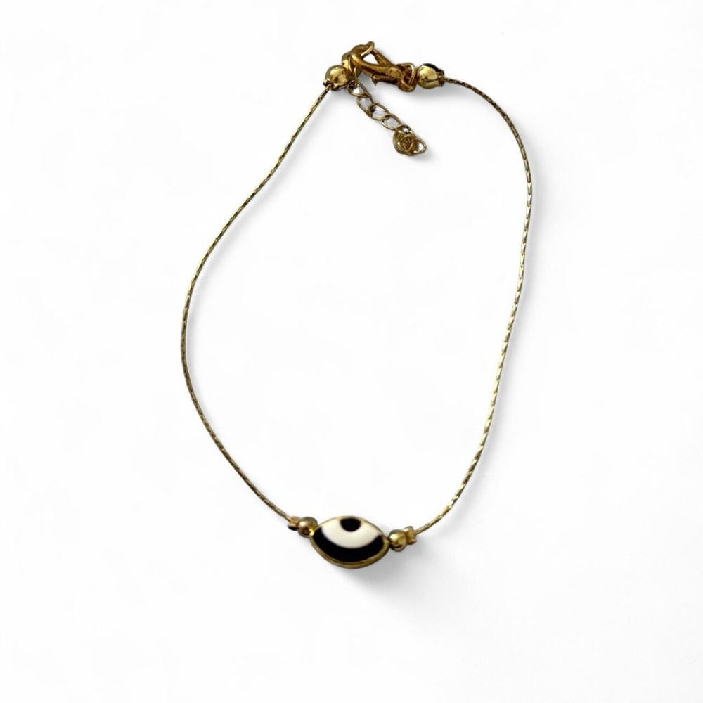 Gold and black evil eye bracelet. Great condition.